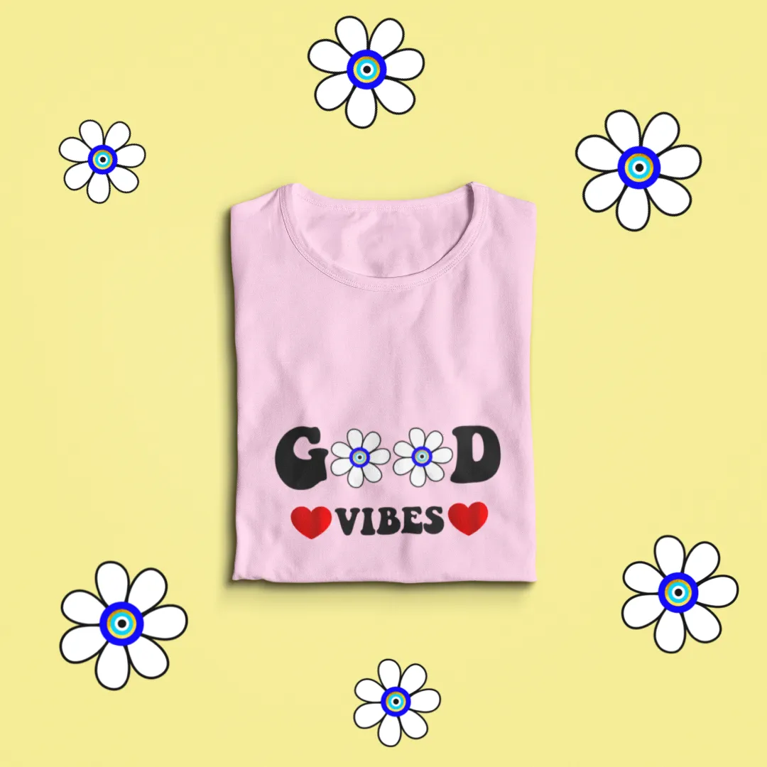 Sure! Heres an optimized title for the e-commerce product:

Trendy Floral Good Vibes Graphic T-Shirt for Women